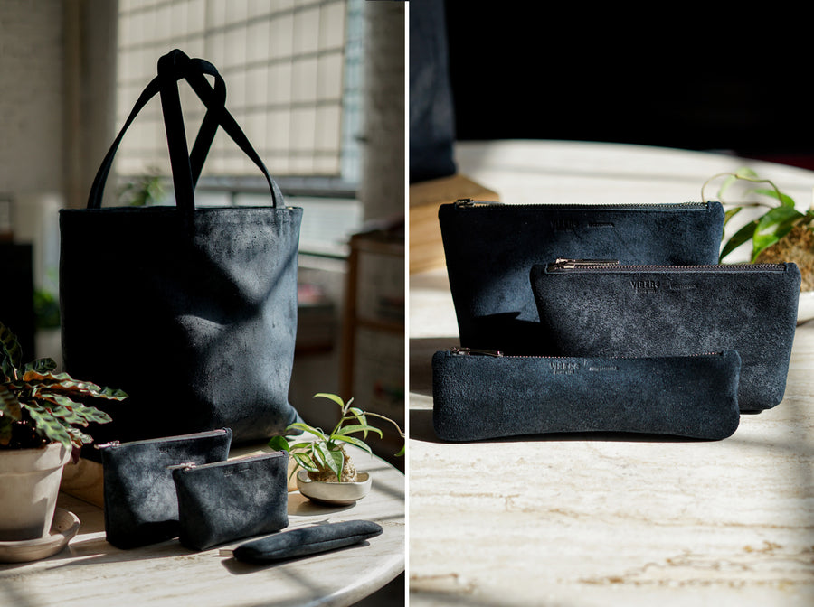 The Viberg tote stands alongside three sizes of Viberg pouches, that are made of the same Charcoal Chamois leather.