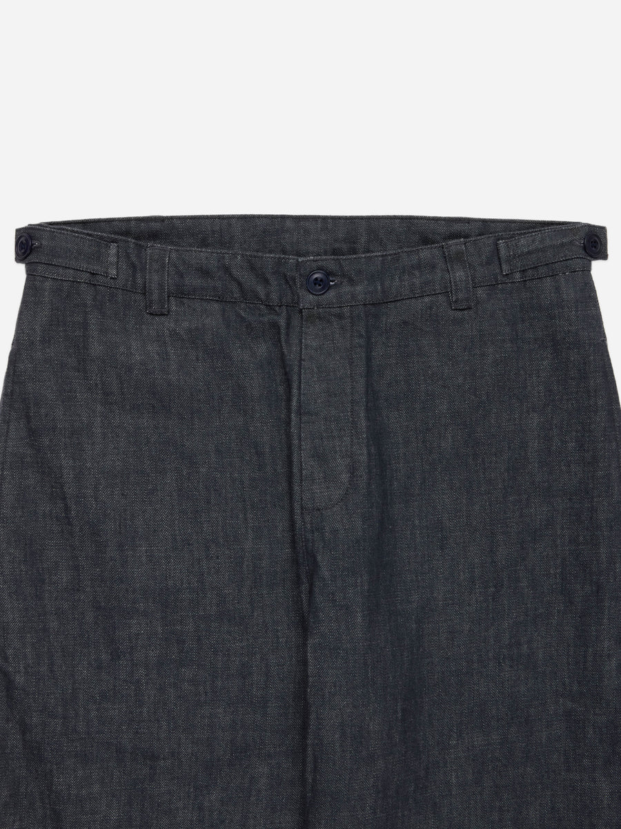 Close-up of dark charcoal gray textured trousers showing the waistband, belt loops, button closure, and front fly on a light gray background.