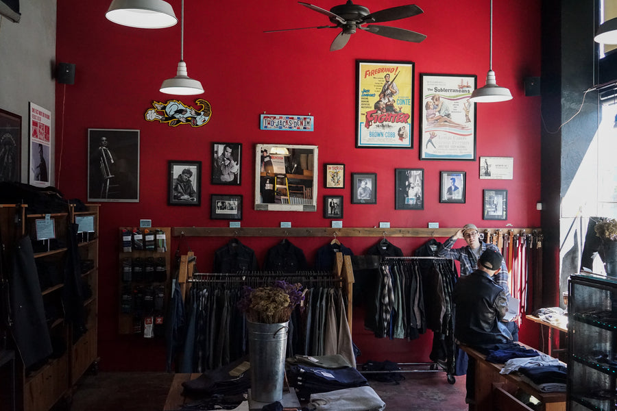 Two men talk inside Oakland-based shop Two Jacks Denim.