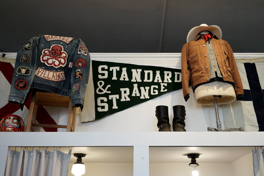 A shop display at Oakland boutique Standard &amp; Strange includes half-body mannequins wearing various shirts and jackets.