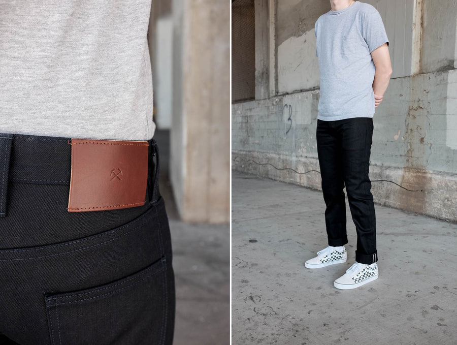 First image shows another close up of the top block of the jean, second photo shows the model is shown here wearing the 222x, double black, which is cuffed to show selvedge id