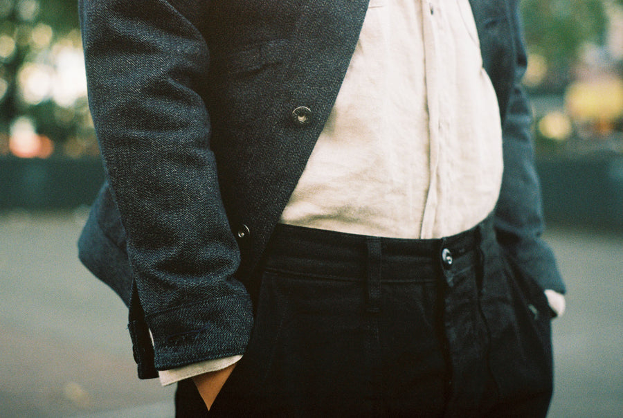 A closeup shot of the Ranch Jacket layered over the natural linen shirt.